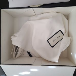 Empty Gucci box and bag